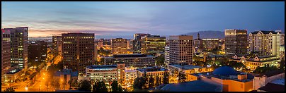 San Jose skyline at dusk from Adobe building to Fairmont hotel. San Jose, California, USA (Panoramic color)