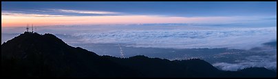 Los Angeles Basin covered with sea of clouds from Mount Wilson, sunrise. San Gabriel Mountains National Monument, California, USA (Panoramic color)