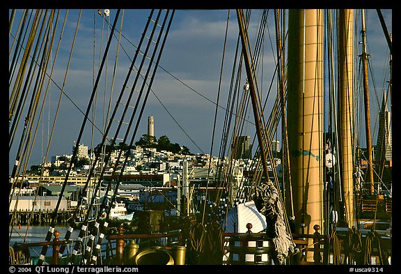 Telegraph Hill and Coit Tower seen through the masts of the Balclutha. San Francisco, California, USA