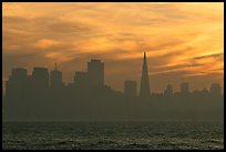 City skyline with sunset clouds seen from Treasure Island. San Francisco, California, USA (color)