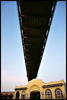 Bay Bridge dwarfs Pier 26 building. San Francisco, California, USA
