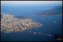 Aerial view of the Bay Bridge, the city, and  the Golden Gate Bridge. San Francisco, California, USA