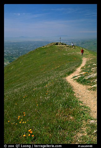 Hiker on trail at the summit of Mission Peak, Mission Peak Regional Park. California, USA (color)