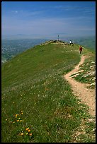 Hiker on trail at the summit of Mission Peak, Mission Peak Regional Park. California, USA ( color)