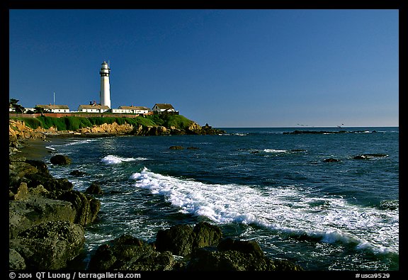 Wave and Pigeon Point Lighthouse, afternoon. San Mateo County, California, USA