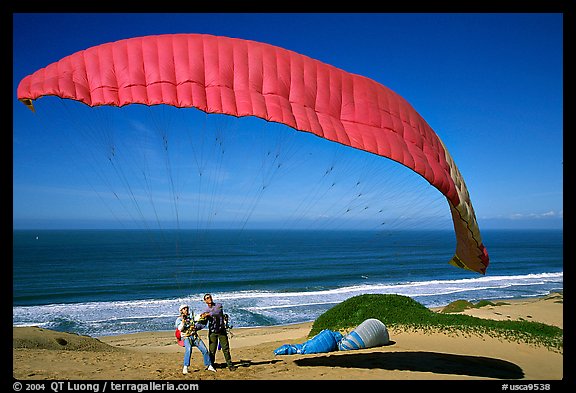 Paragliders practising in sand dunes, Marina. California, USA