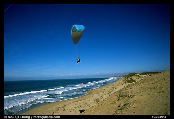 Paragliders soaring above Marina sand dunes. California, USA