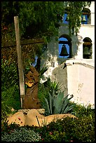 Cross, statue of father, belltower, Mission San Diego de Alcala. San Diego, California, USA (color)