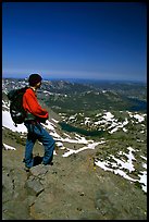 Hiker standing on top of Round Top Mountain. Mokelumne Wilderness, Eldorado National Forest, California, USA ( color)