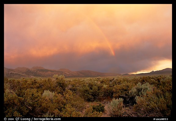 Rainbow and storm over Mono Basin, evening. Mono Lake, California, USA