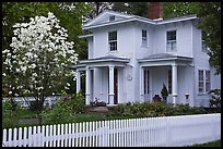 White picket fence and house, Essex. Connecticut, USA ( color)