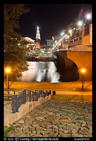 Quay by Connecticut River and nighttime skyline. Hartford, Connecticut, USA (color)