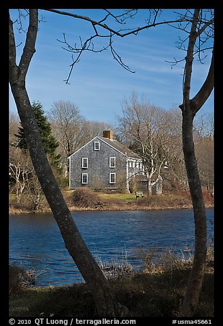 Historic house next to pond, Sandwich. Cape Cod, Massachussets, USA