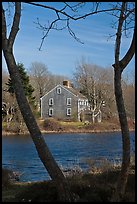 Historic house next to pond, Sandwich. Cape Cod, Massachussets, USA ( color)