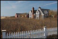 Fence and cottages in winter, Truro. Cape Cod, Massachussets, USA ( color)