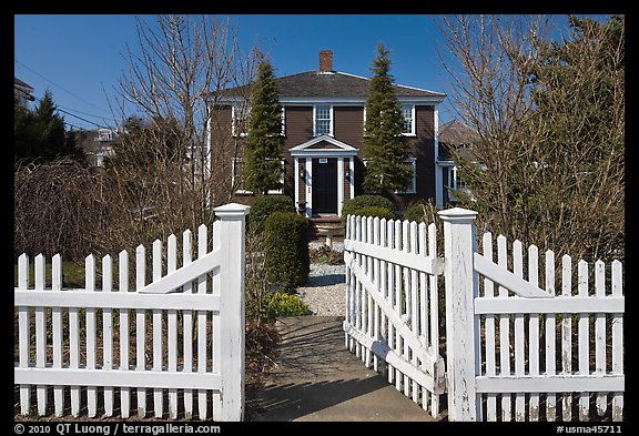 White picket fence and house, Provincetown. Cape Cod, Massachussets, USA (color)