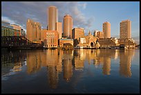 Boston skyline from harbor, sunrise. Boston, Massachussets, USA (color)