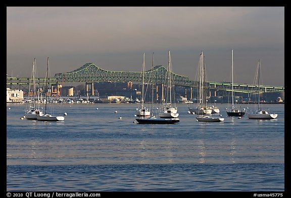 Harbor with anchored boats and bridge. Boston, Massachussets, USA