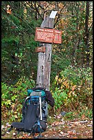 Backpack and marker for last 100 miles, wildest of Appalachian trail. Maine, USA (color)