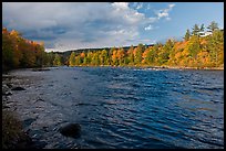 Fast-flowing Penobscot River and fall foliage. Maine, USA (color)
