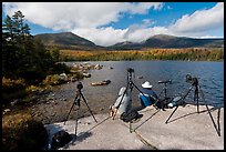Photographers at Sandy Stream Pond waiting with cameras set up. Baxter State Park, Maine, USA (color)