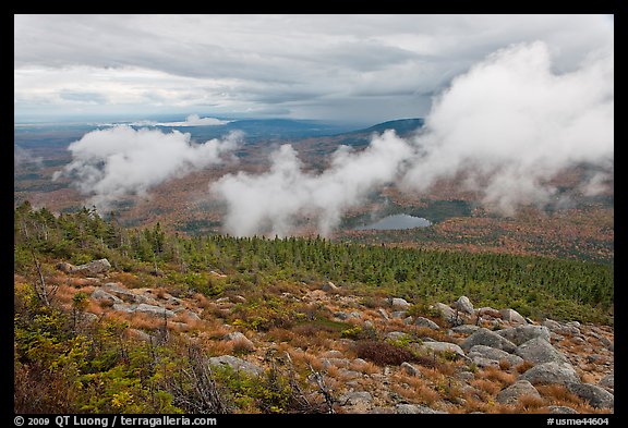 Autumn landscape with clouds hovering below mountains. Baxter State Park, Maine, USA
