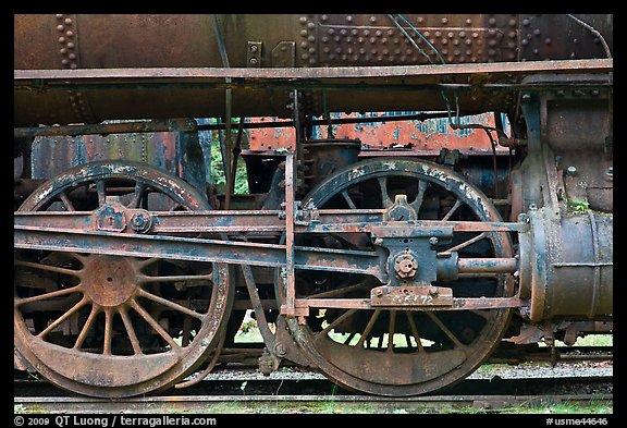 Wheels and pistons of vintage locomotive. Allagash Wilderness Waterway, Maine, USA