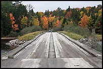 Wood bridge in the fall. Allagash Wilderness Waterway, Maine, USA