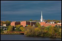Penobscot River and downtown with storm clouds. Bangor, Maine, USA
