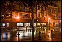 Street with wet pavement at night. Bar Harbor, Maine, USA ( color)