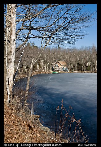 House by frozen lake. Maine, USA (color)