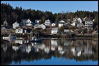 Reflection of hillside houses. Stonington, Maine, USA ( color)
