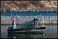Lobstermen hauling traps. Stonington, Maine, USA (color)