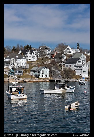 Lobster boats and houses on hillside. Stonington, Maine, USA