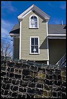 Lobster traps and house. Stonington, Maine, USA