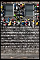 Facade decorated with buoys. Maine, USA