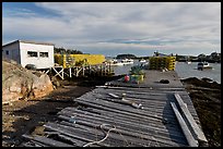 Deck, lobster traps, and harbor. Corea, Maine, USA ( color)