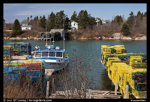Lobster traps and boat. Corea, Maine, USA