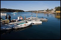 Small boats, harbor and village. Isle Au Haut, Maine, USA (color)