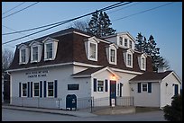 Post office in federal style at dusk. Stonington, Maine, USA (color)