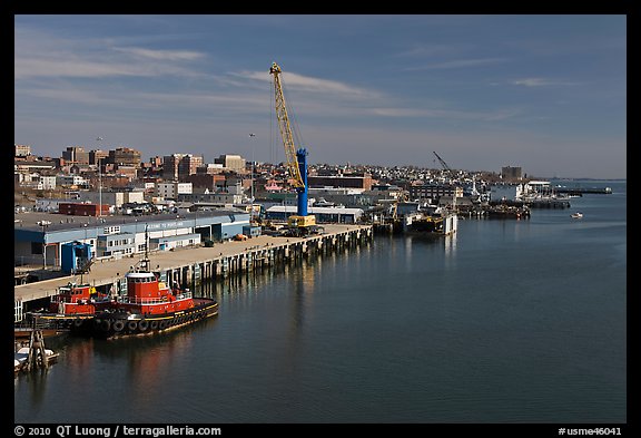 Shipping harbor with tugboats and crane. Portland, Maine, USA (color)
