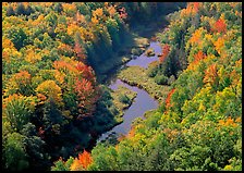 River with curve and fall forest from above, Porcupine Mountains State Park. Upper Michigan Peninsula, USA