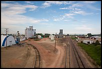 Railroad, grain elevator, and fertilizer plant, Bowman. North Dakota, USA (color)