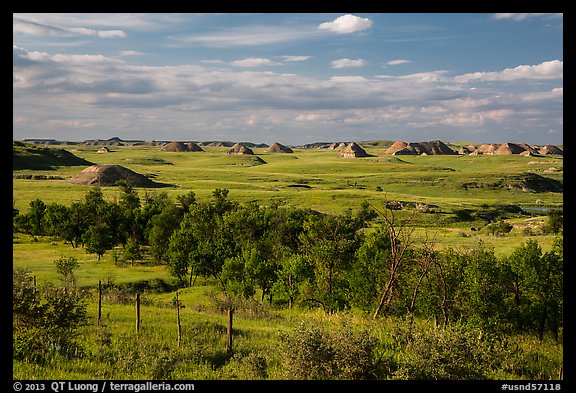 Farmlands and distant badlands. North Dakota, USA