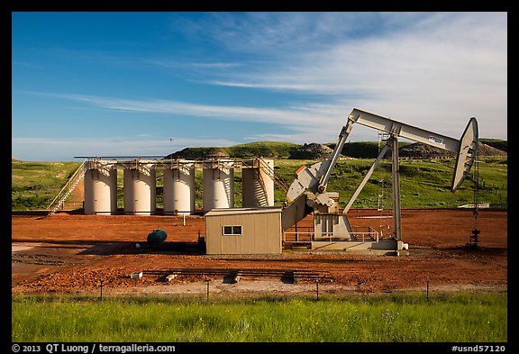 Pumping unit and tanks, oil well. North Dakota, USA