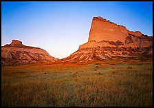 Scotts Bluff, Mitchell Pass, and South Bluff with the warm light of sunrise. Scotts Bluff National Monument. Nebraska, USA ( color)