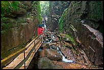Hiking the Flume in the rain, Franconia Notch State Park. New Hampshire, USA (color)