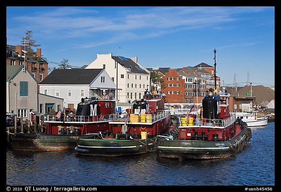 Tugboats and waterfront buildings. Portsmouth, New Hampshire, USA (color)