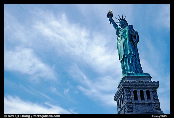 Statue of Liberty and pedestal against sky. NYC, New York, USA