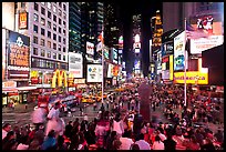 Crowds on Times Squares at night. NYC, New York, USA ( color)